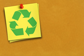 recycling symbol on yellow note