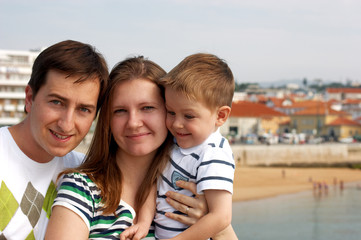 Fototapeta na wymiar Happy family of three at European destination