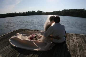 Foto op Canvas wedding couple sitting by lake elegant © Paul Retherford