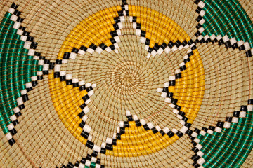 Naklejka premium Colorful hand woven African basket