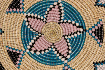 Colorful hand woven African basket
