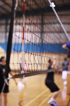 Indoor Volleyball court with players