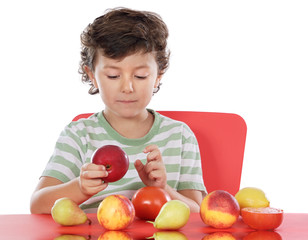 Fototapeta premium child playing with fruits