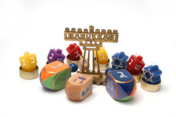 Many Dreidals and small hannukia for Hannukah
