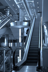 Free diagonal escalators stairway in center and ceiling