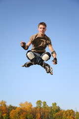 jumping man in the roller skates