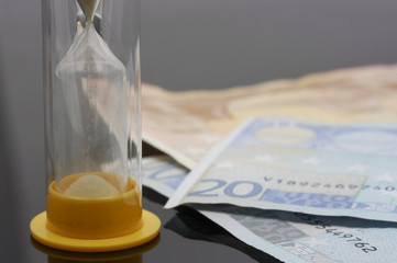 hourglass and euro