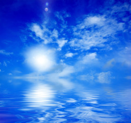 Fototapeta na wymiar beautiful summer sky with water reflection