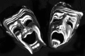 The masks of tragedy and comedy rendered as ghosts