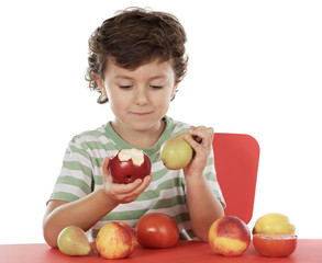 Fototapeta premium child playing with fruits