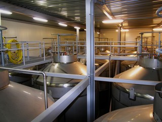 big stainless steel beer tanks at the brewery