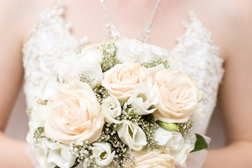 Bride with bunch of flowers