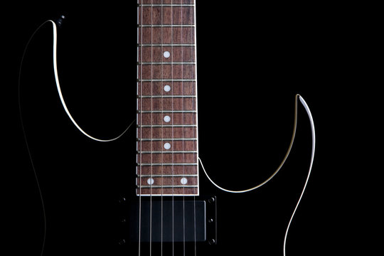 electric guitar silhouette isolated on black