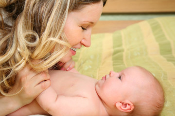 Mum looks at the baby