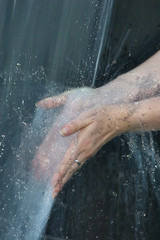 hands in cold water