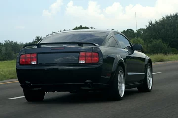 Photo sur Plexiglas Voitures rapides black american muscle car on the road