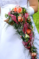 Bride holding wedding bouquet