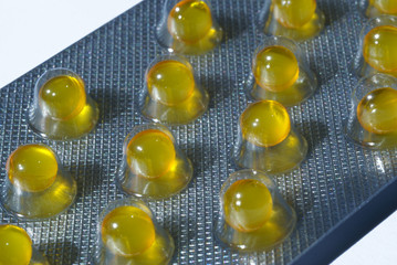 Small yellow capsules