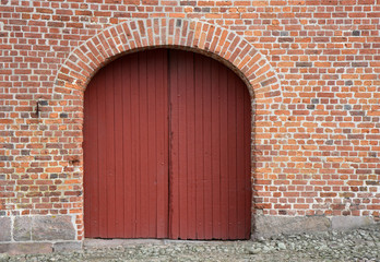 Fototapeta na wymiar Gate in the Old Barn