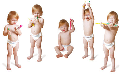 baby with toothbrush
