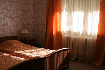 Hotel room with sunlight in the morning or in the daytime.