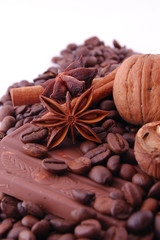 Coffee beans, chocolate, walnuts and cinnamon