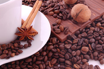 Coffee beans, chocolate, walnuts and cinnamon