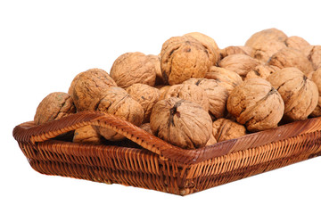 walnuts in the basket-isolated on the white