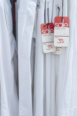 White women's slacks on sale rack