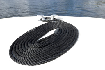 Coiled rope on the bow of a boat