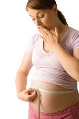 Pregnant woman measuring