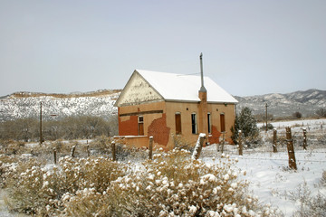 Old Adobe Schoolhouse in Snow