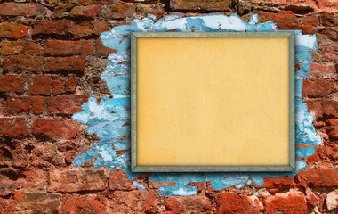 billboard against brick wall