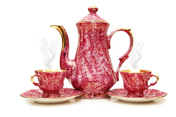 Tea pot and cups isolated on  the white