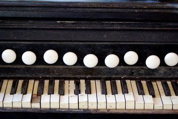 Fototapeta na wymiar Old piano with broken keys