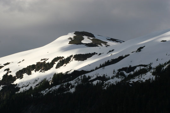 Mountains with snow and clouds