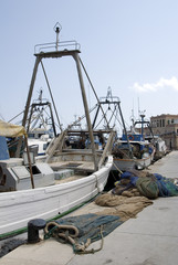fishing boat moored in harbour