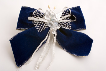 christmas blue bow decorated with glass angel