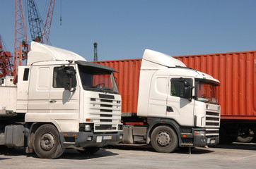 Trucks and containers in port