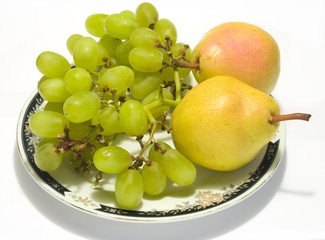 plate with pears and grapes cropped with white background