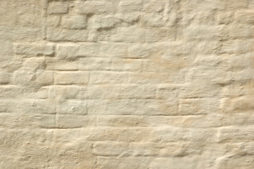 The whitewashed brick wall