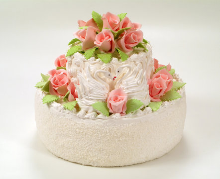 A cake with  roses.