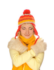 Frozen girl in colorful winter clothing over white background