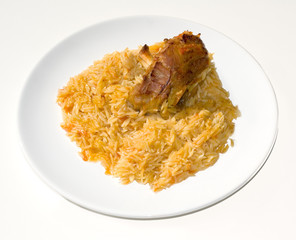 lamb with pasta in white dish