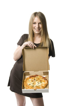 Woman holding pizza