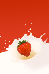 strawberry splashing in milk