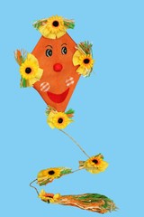 kite - autumn decoration on blue background