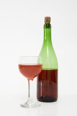 Red wine bottle and glass isolated on white