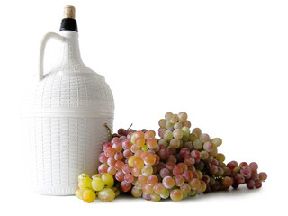 Garrafão de vinho com uvas