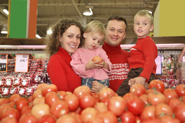 Fototapeta premium parents with children in supermarket